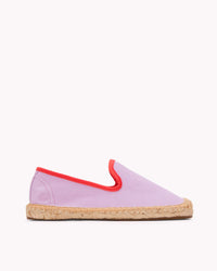 Kids lavender espadrille shoes with red piping on gray background