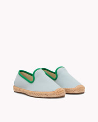 Kids mint espadrille shoes with green piping on gray background