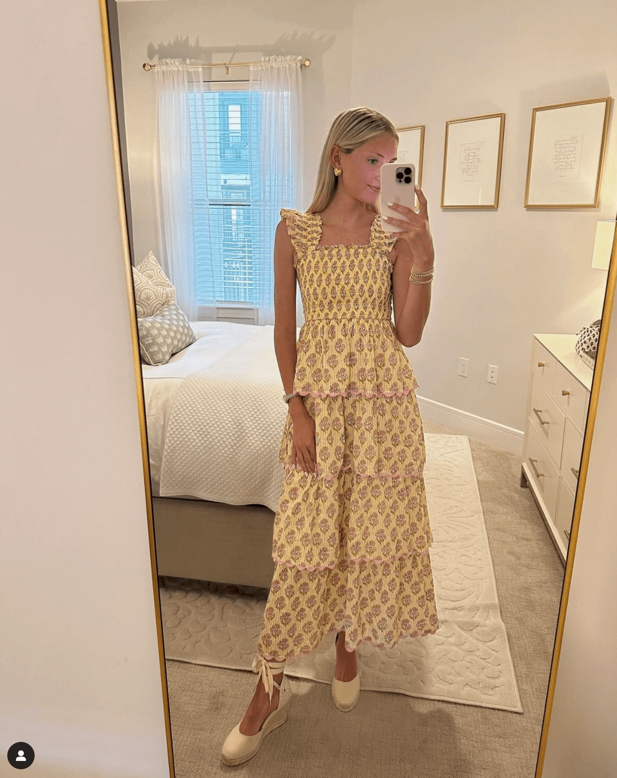 Woman wearing ivory espadrille wedges in a ivory and gold dress in UGC style